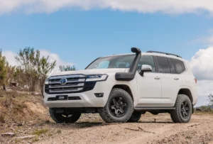 Safari ARMAX snorkel installed on Toyota Land Cruiser 300 Series, showing raised intake and rugged off-road styling.