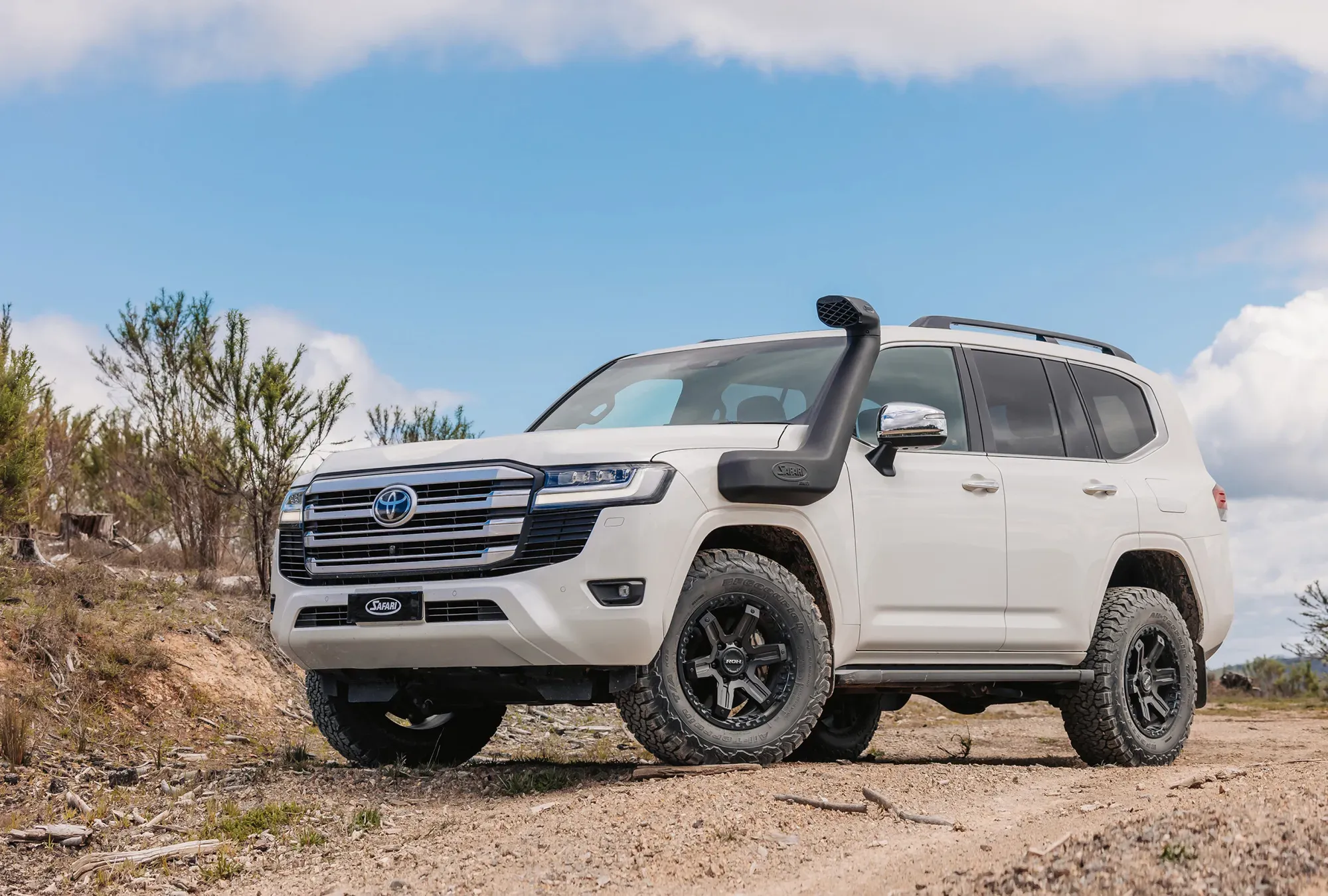 Safari ARMAX snorkel installed on Toyota Land Cruiser 300 Series, showing raised intake and rugged off-road styling.