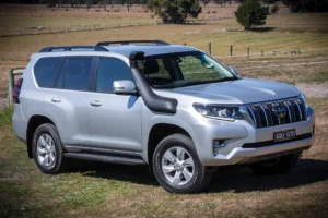 Safari snorkel SS190HF installed on Toyota Prado 150 Series, showing raised air intake and rugged off-road design.