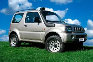 Alt Text: Safari snorkel installed on Suzuki Jimny 1998–2012, showing raised air intake and rugged off-road design.