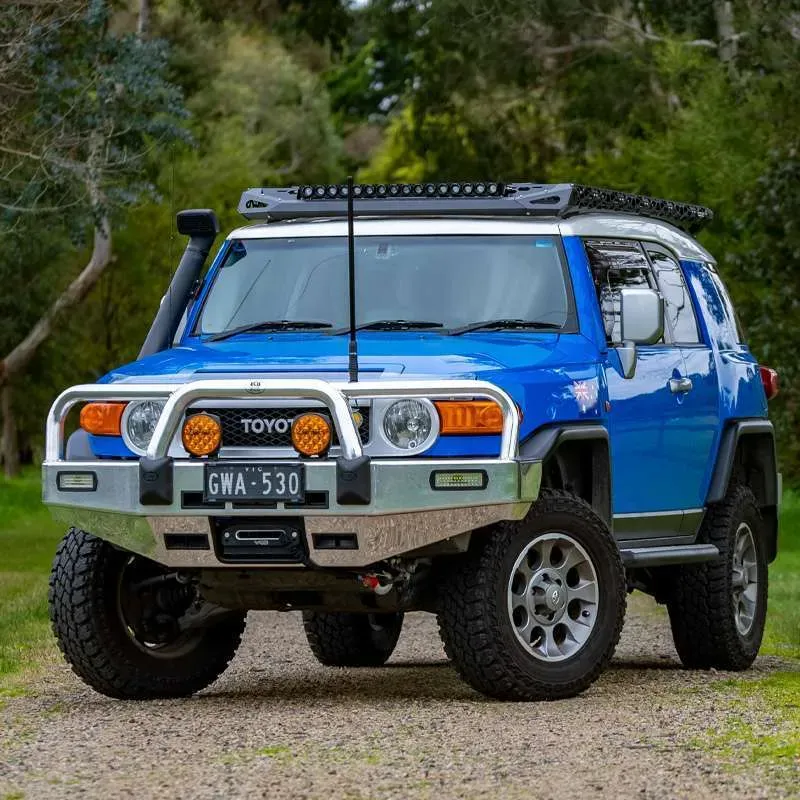 TrailMax platform rack on toyota fj cruiser with recovery boards attached