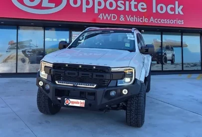 Ford Everest Platinum touring upgrade with bull bar, GVM suspension lift, ROH wheels, and dual battery system installed at Opposite Lock Cardiff.